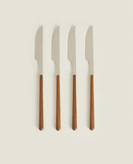 BOX 4 KNIVES WITH ROUND HANDLE DETAIL