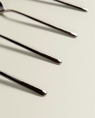 BOX OF 4 SHINY STEEL DESSERT SPOONS